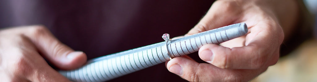 jeweler checking ring size
