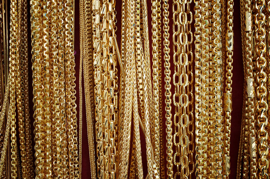 variety of gold chains hanging