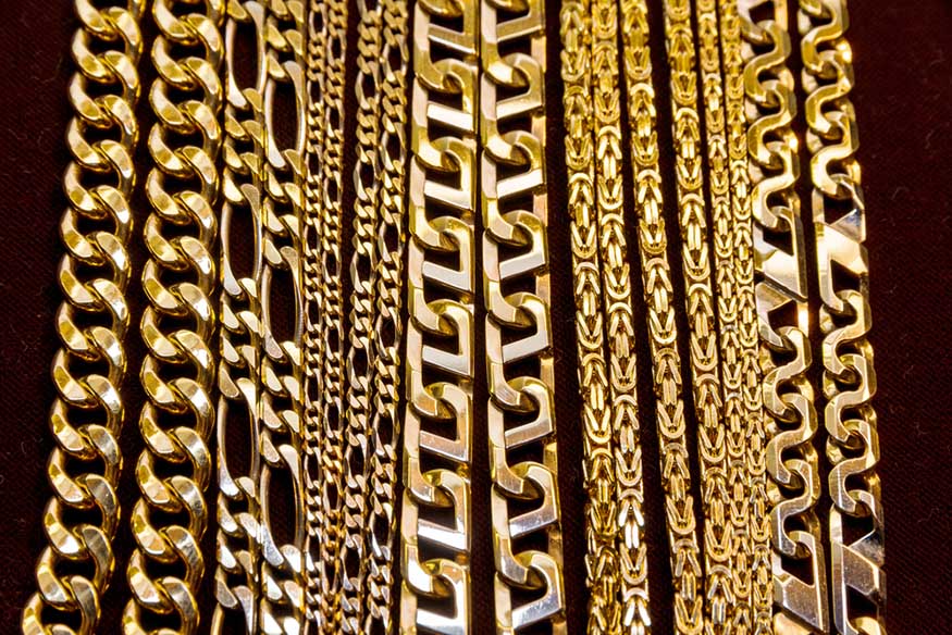various gold chains hanging